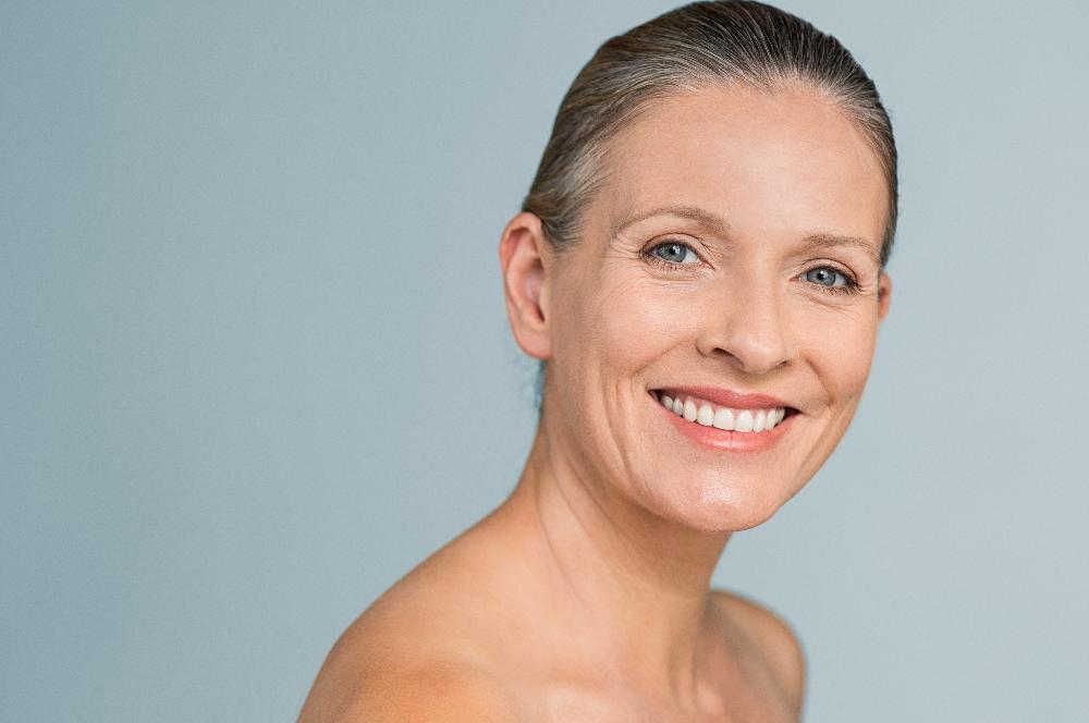 older woman with slicked back hair | microneedling marysville wa
