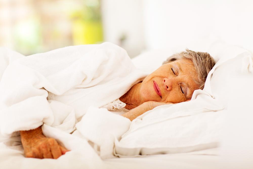 older woman sleep in bed | sleep apnea marysville wa