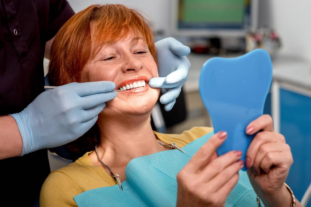 A woman receiving a dental exam | marysville dental clinic