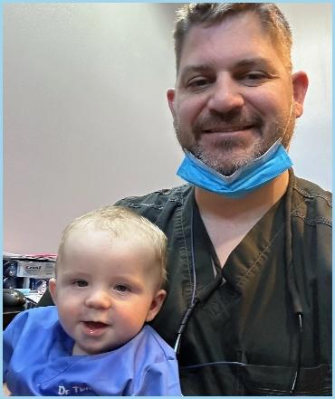dr. timmerman with child patient | dentist marysville wa