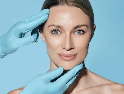 woman with bright blue eyes smiling | kybella marysville wa