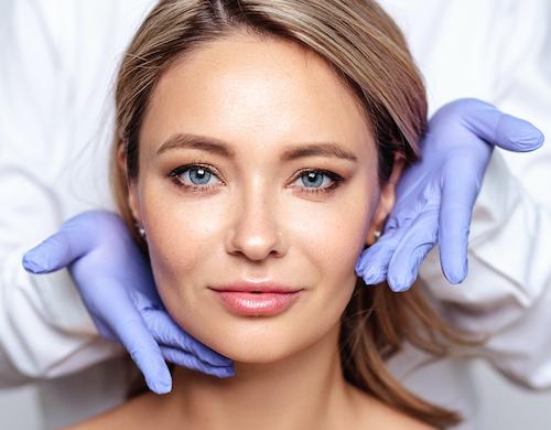 woman with dentist wearing gloves | botox marysville