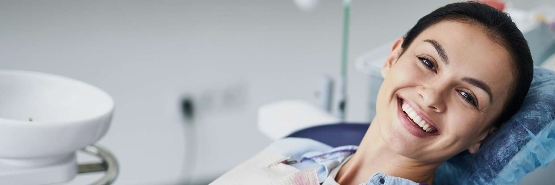 A smiling woman at the dentist | dentist Marysville, WA