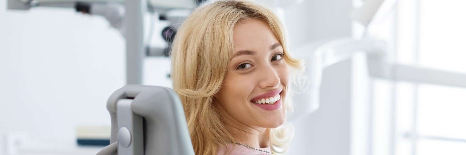 A smiling woman at the dentists office | dentist Marysville, WA