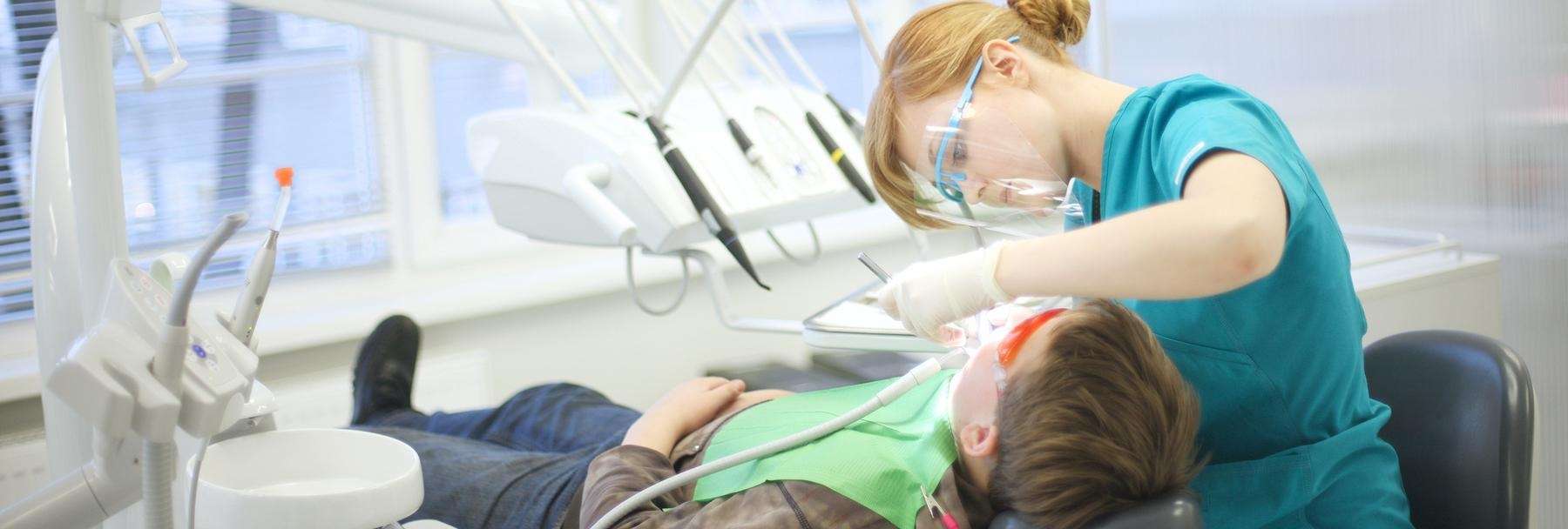A boy getting a teeth cleaning | dentist Marysville, WA