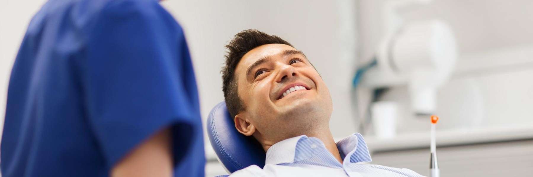 A smiling man at the dentist's office | dentist near me marysville wa